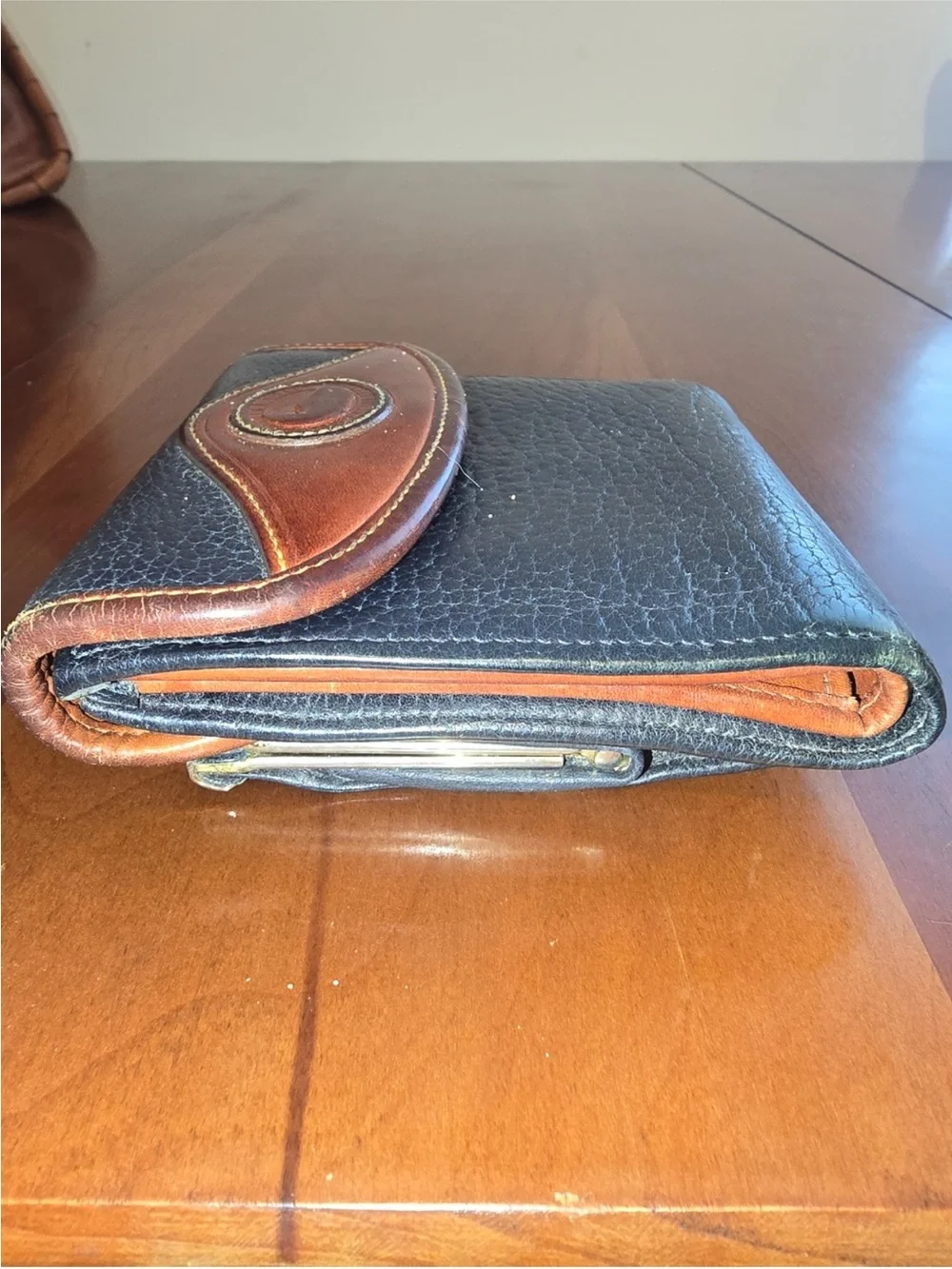 Dooney & Bourke Black and Brown Leather Bi-Fold Wallet vintage.